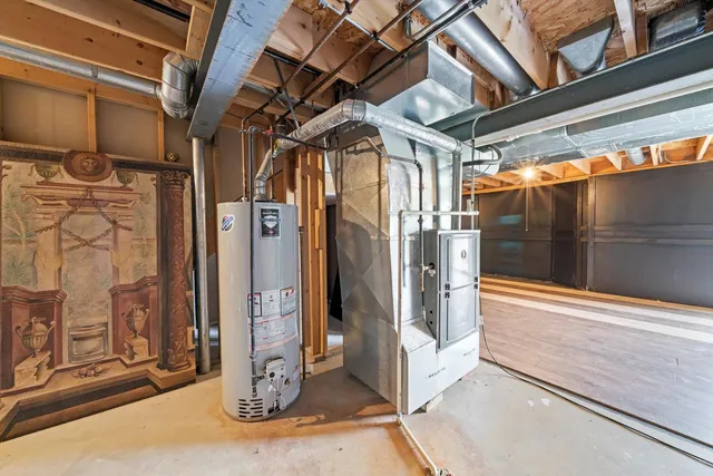 a view of a house with backyard and garden