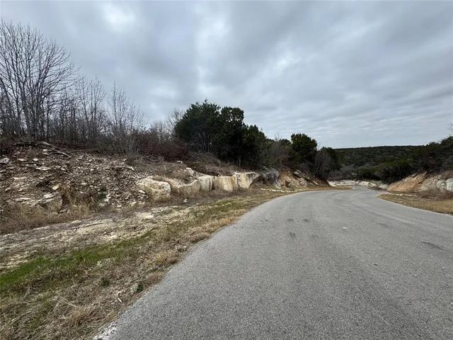 a view of a road with a snow on the road