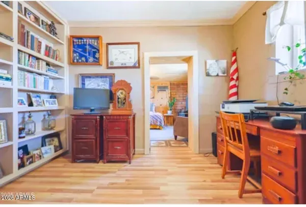 a view of a workspace with furniture