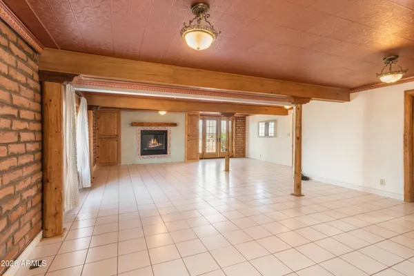 a view of an empty room and window