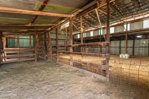 a view of a building with a yard