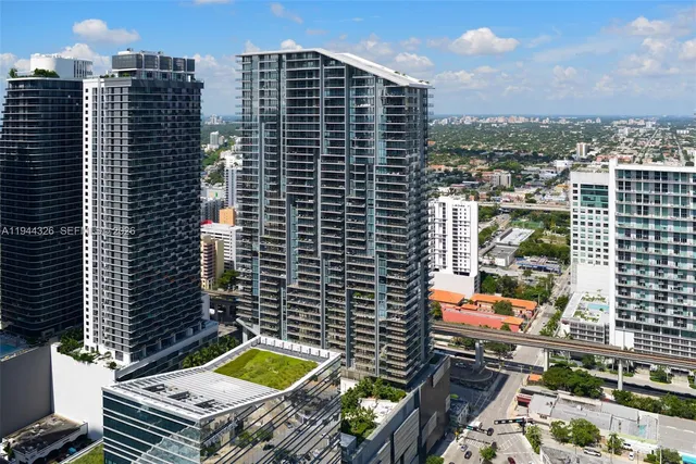 a view of a city with tall buildings