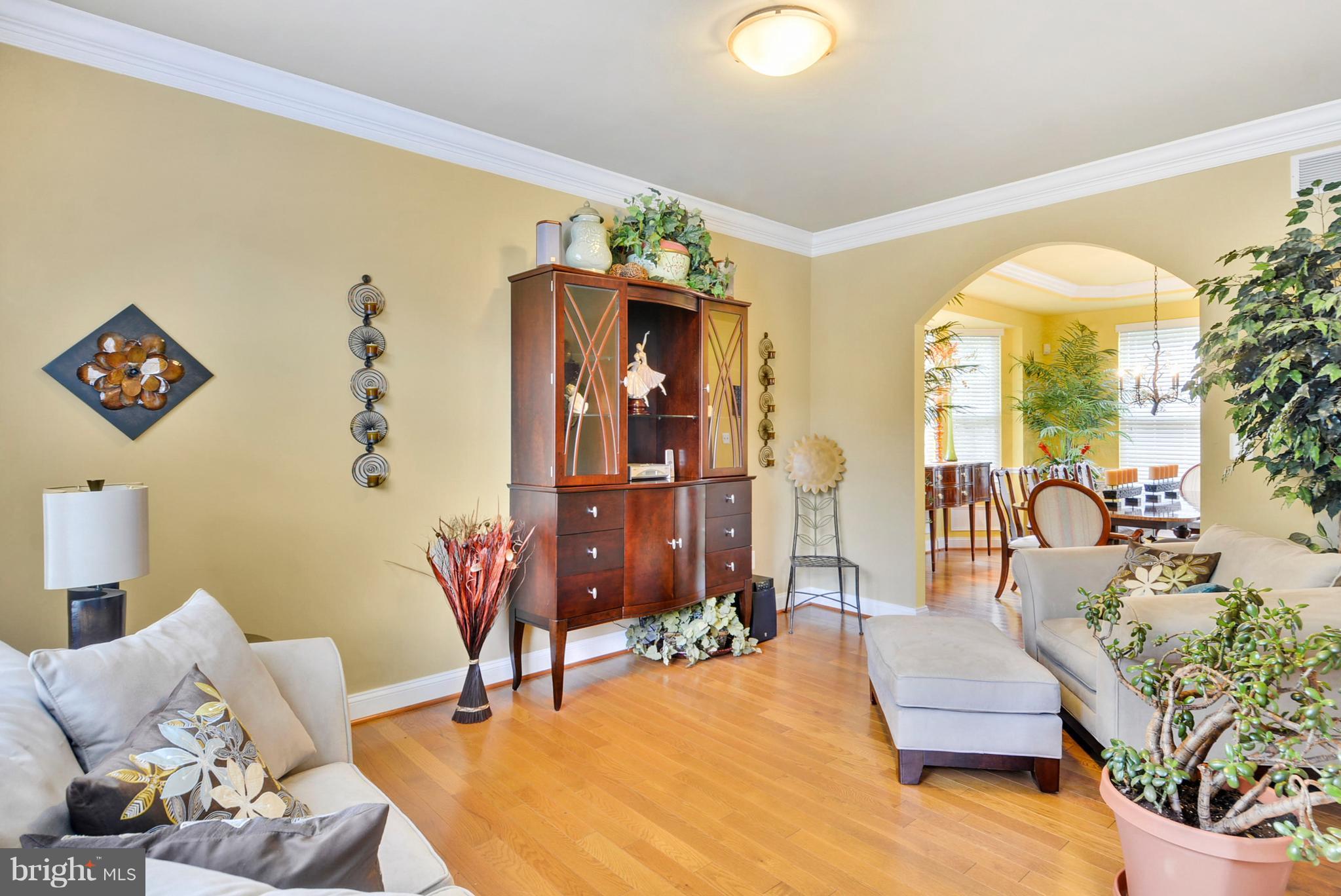 826 Swift Road Pasadena, MD 21122 - Photo 11 of 30 Spacious Living Room has hardwood floors.