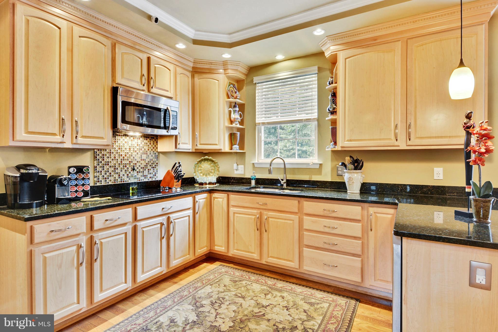 826 Swift Road Pasadena, MD 21122 - Photo 4 of 30 Kitchen has granite counter tops.