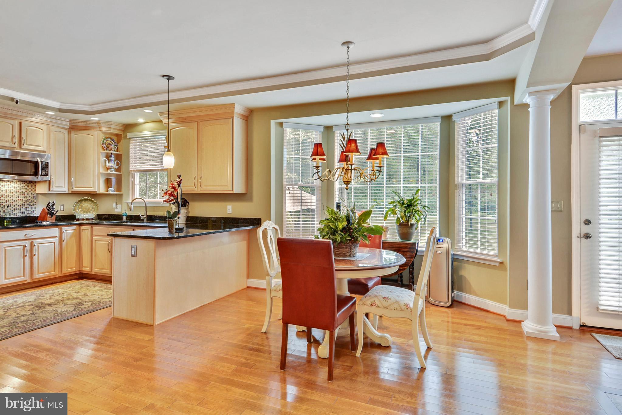 826 Swift Road Pasadena, MD 21122 - Photo 7 of 30 Kitchen has a Breakfast Area which leads to patio.