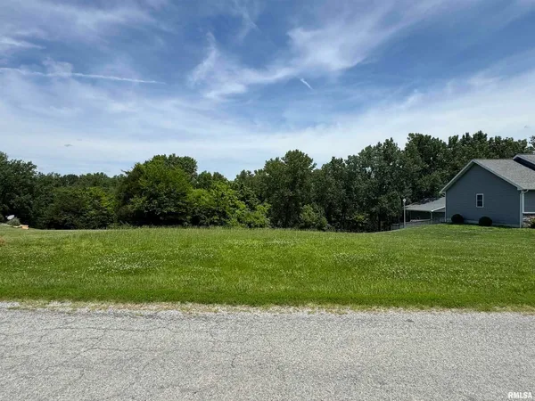 a view of a house with a big yard