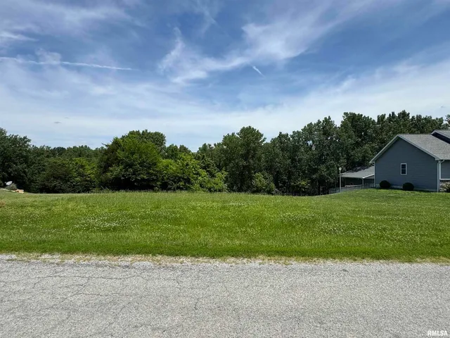 a view of a house with a big yard