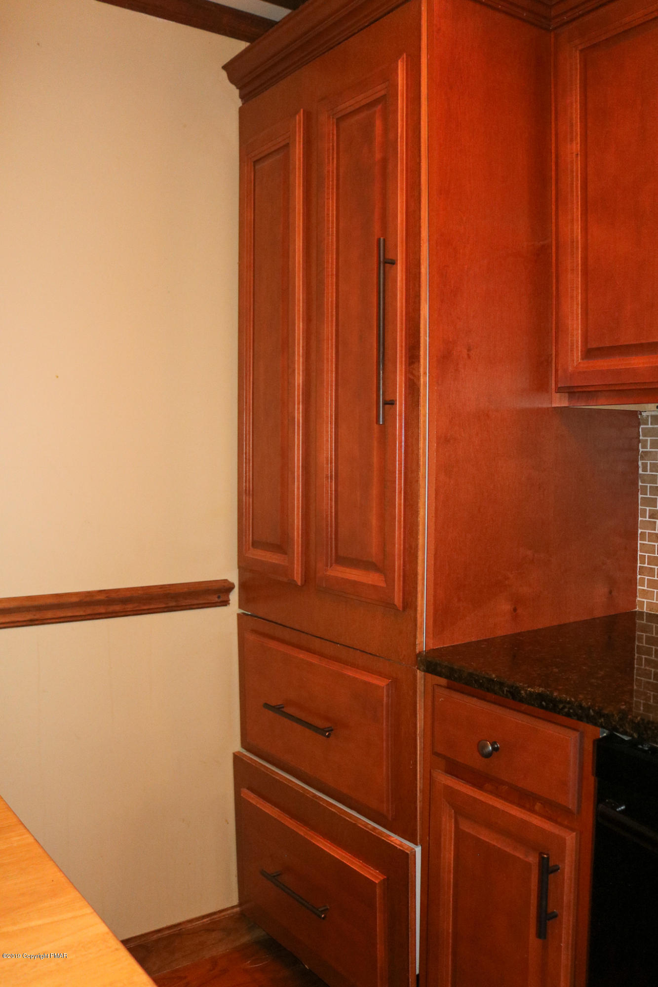 1258 Ranger Trail Pocono Lake, PA 18347 - Photo 36 of 44 REFRIGERATOR/WOOD CABINET LOOK