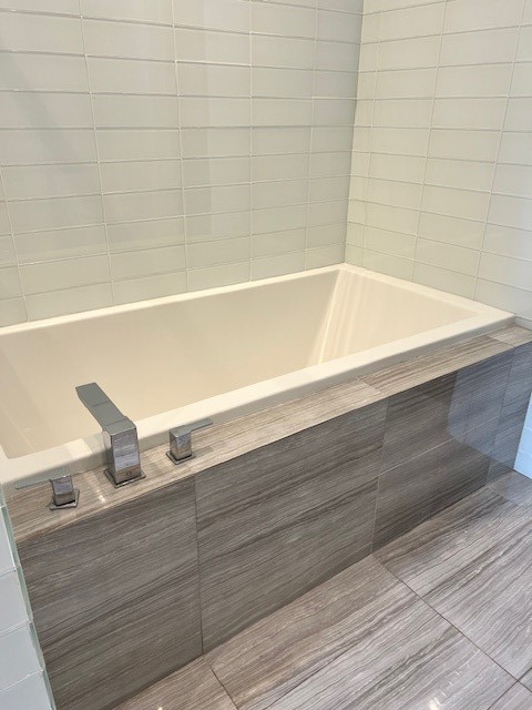 1211 Caroline Street, Unit 1007 Houston, TX 77002 - Photo 11 of 46 a close view of shower