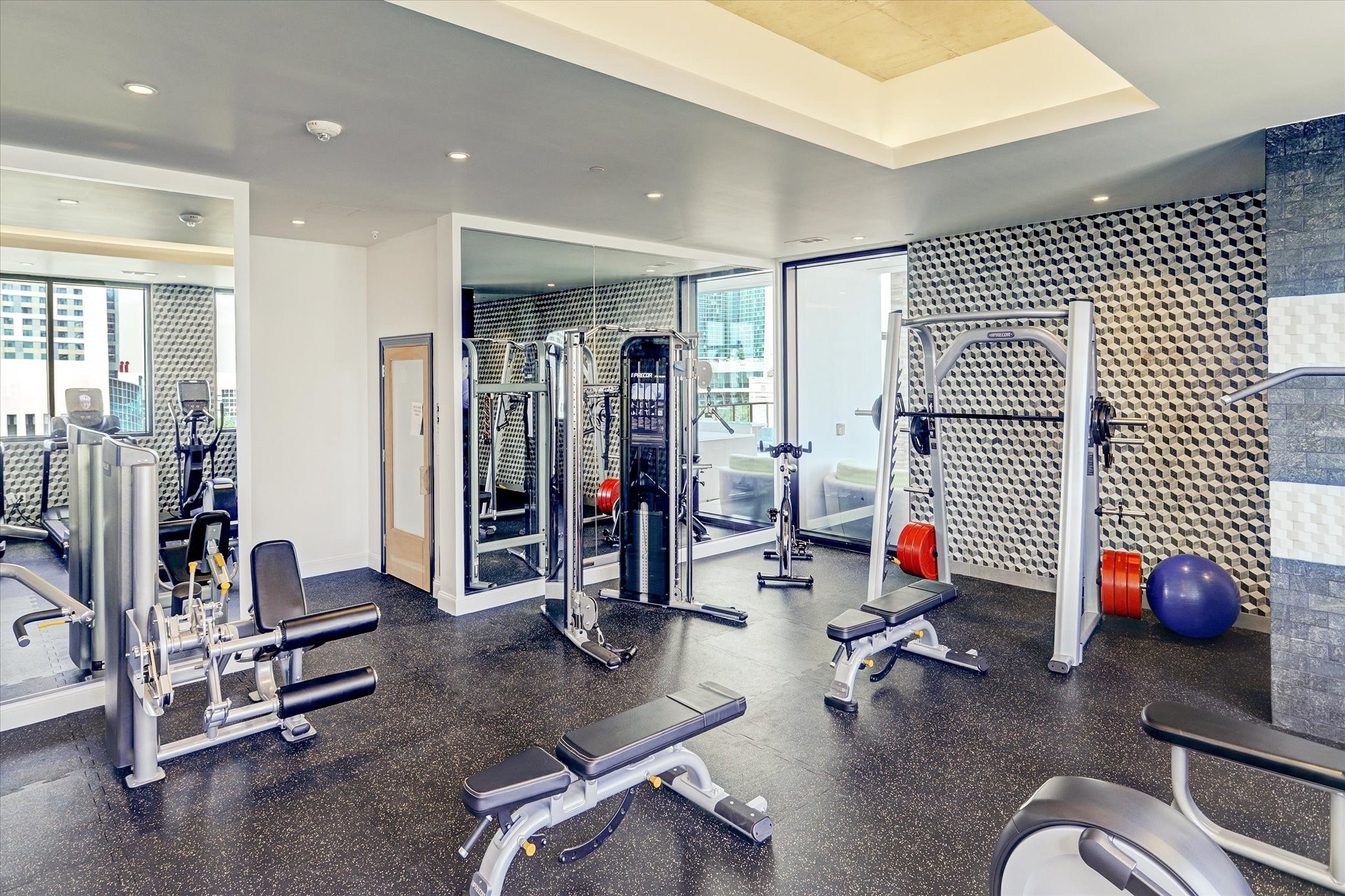1211 Caroline Street, Unit 1007 Houston, TX 77002 - Photo 21 of 46 a view of a room with gym equipment