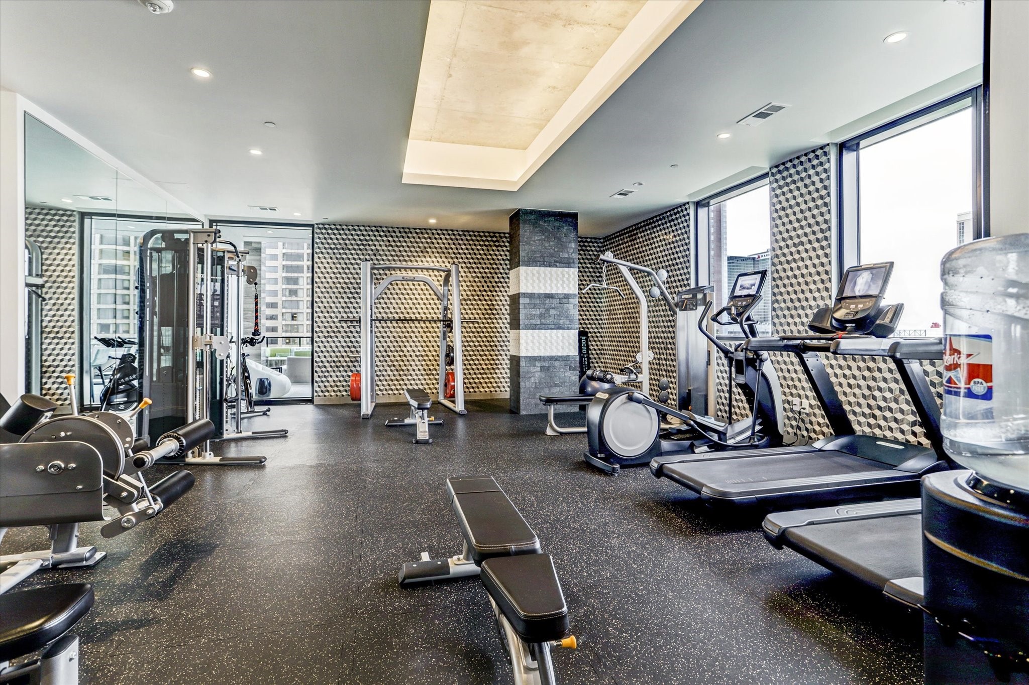 1211 Caroline Street, Unit 1007 Houston, TX 77002 - Photo 22 of 46 a view of a room with gym equipment