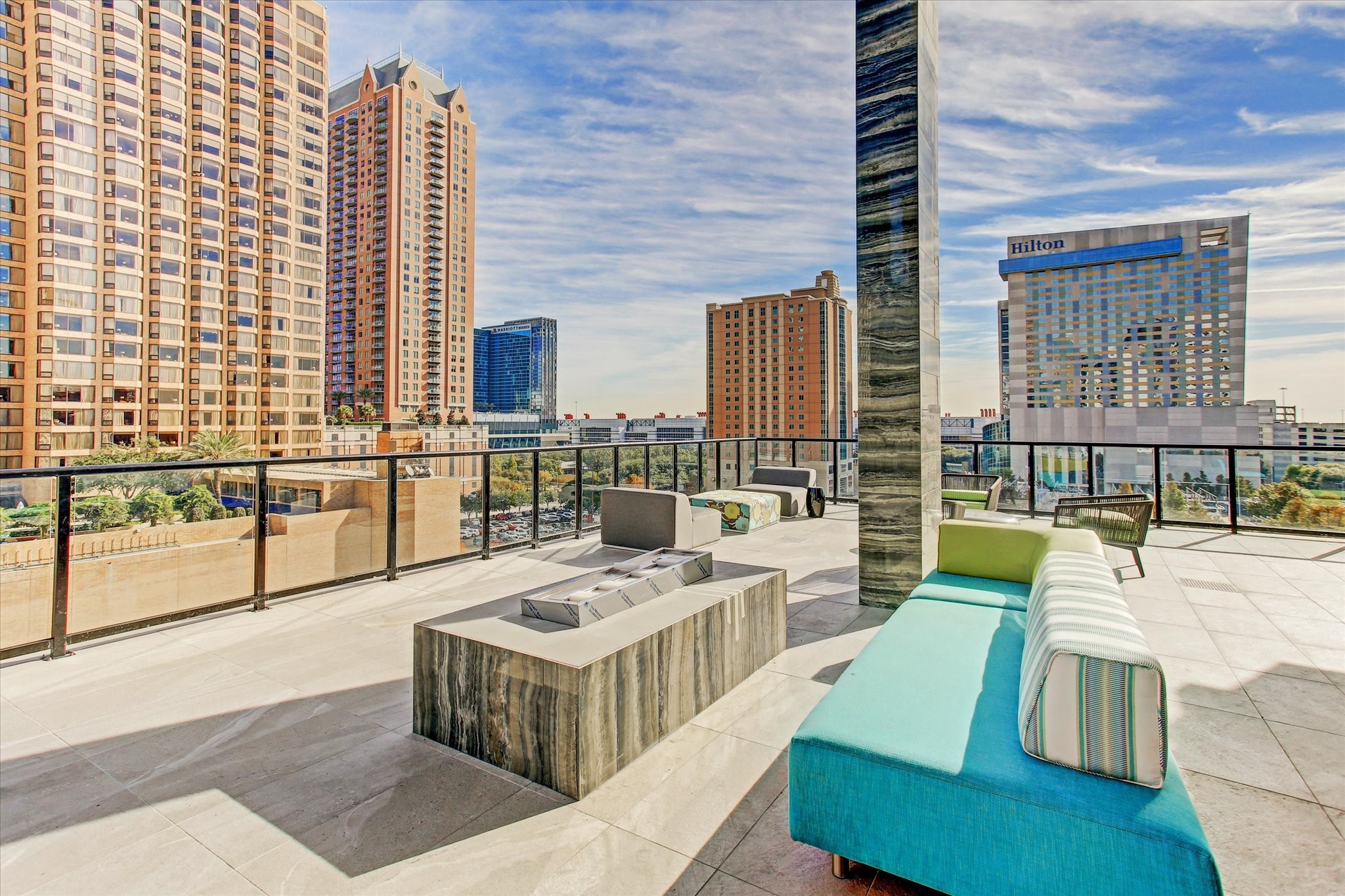 1211 Caroline Street, Unit 1007 Houston, TX 77002 - Photo 26 of 46 a balcony with furniture and large windows