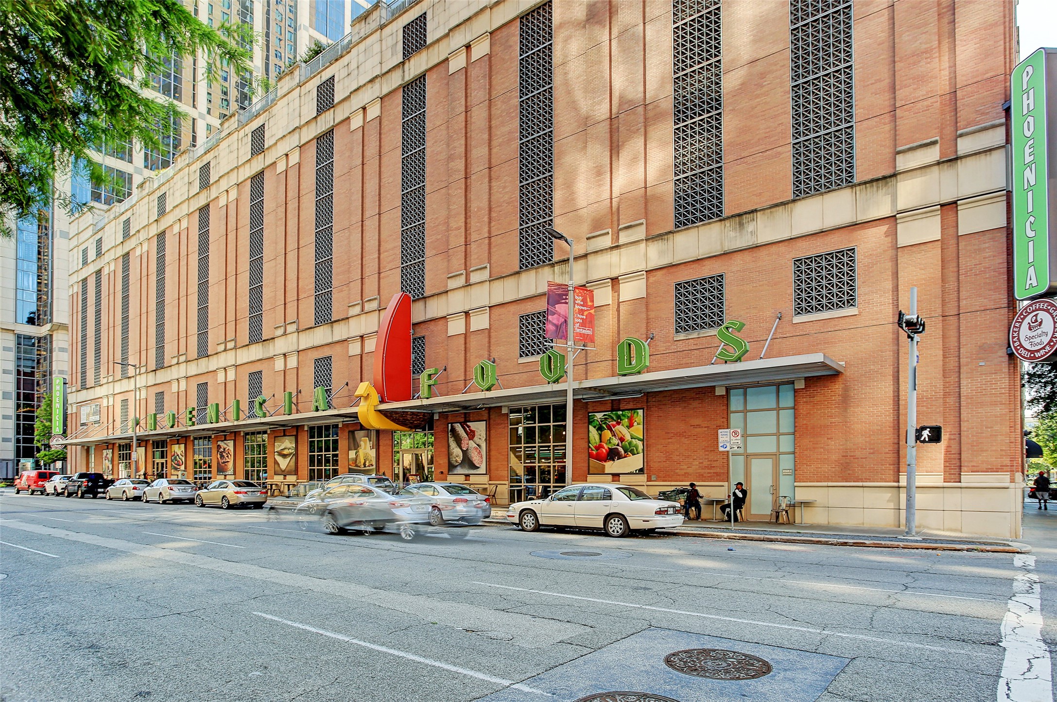 1211 Caroline Street, Unit 1007 Houston, TX 77002 - Photo 32 of 46 a car parked in front of a building