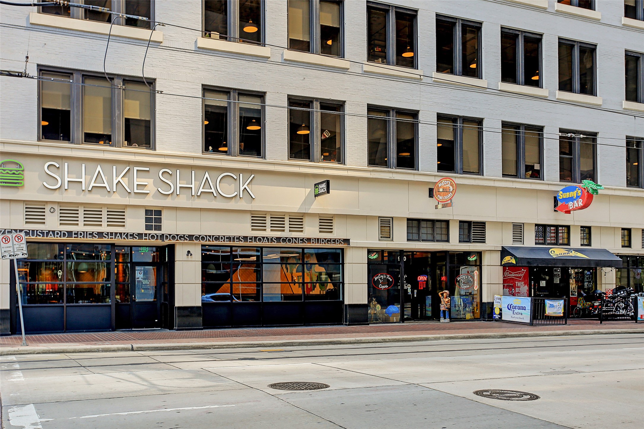 1211 Caroline Street, Unit 1007 Houston, TX 77002 - Photo 34 of 46 a view of street with shops