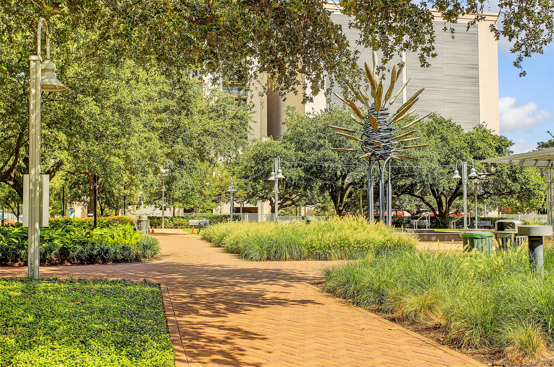 1211 Caroline Street, Unit 1007 Houston, TX 77002 - Photo 36 of 46 a view of a yard and front view of a house