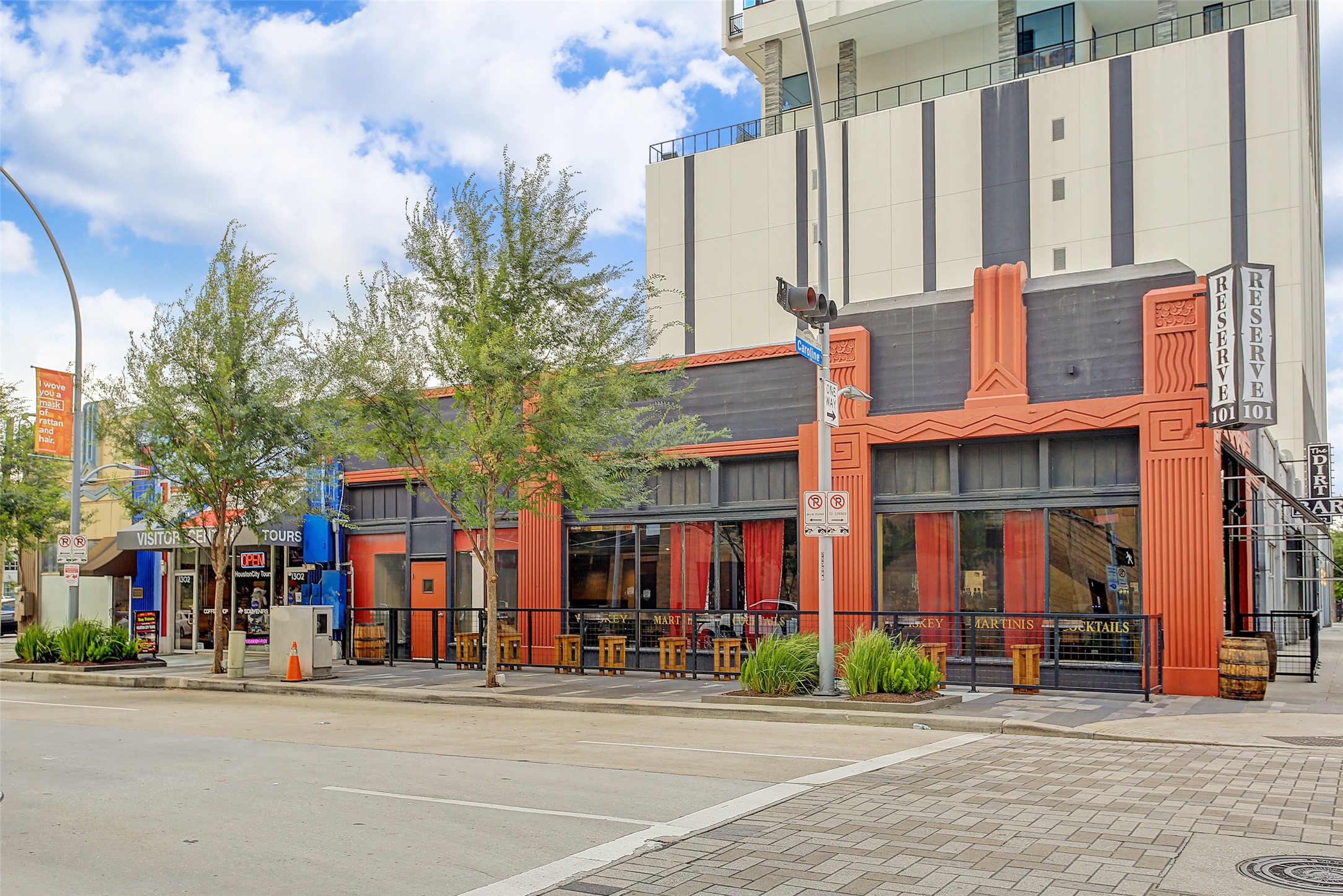 1211 Caroline Street, Unit 1007 Houston, TX 77002 - Photo 39 of 46 a red brick building on the side of a street