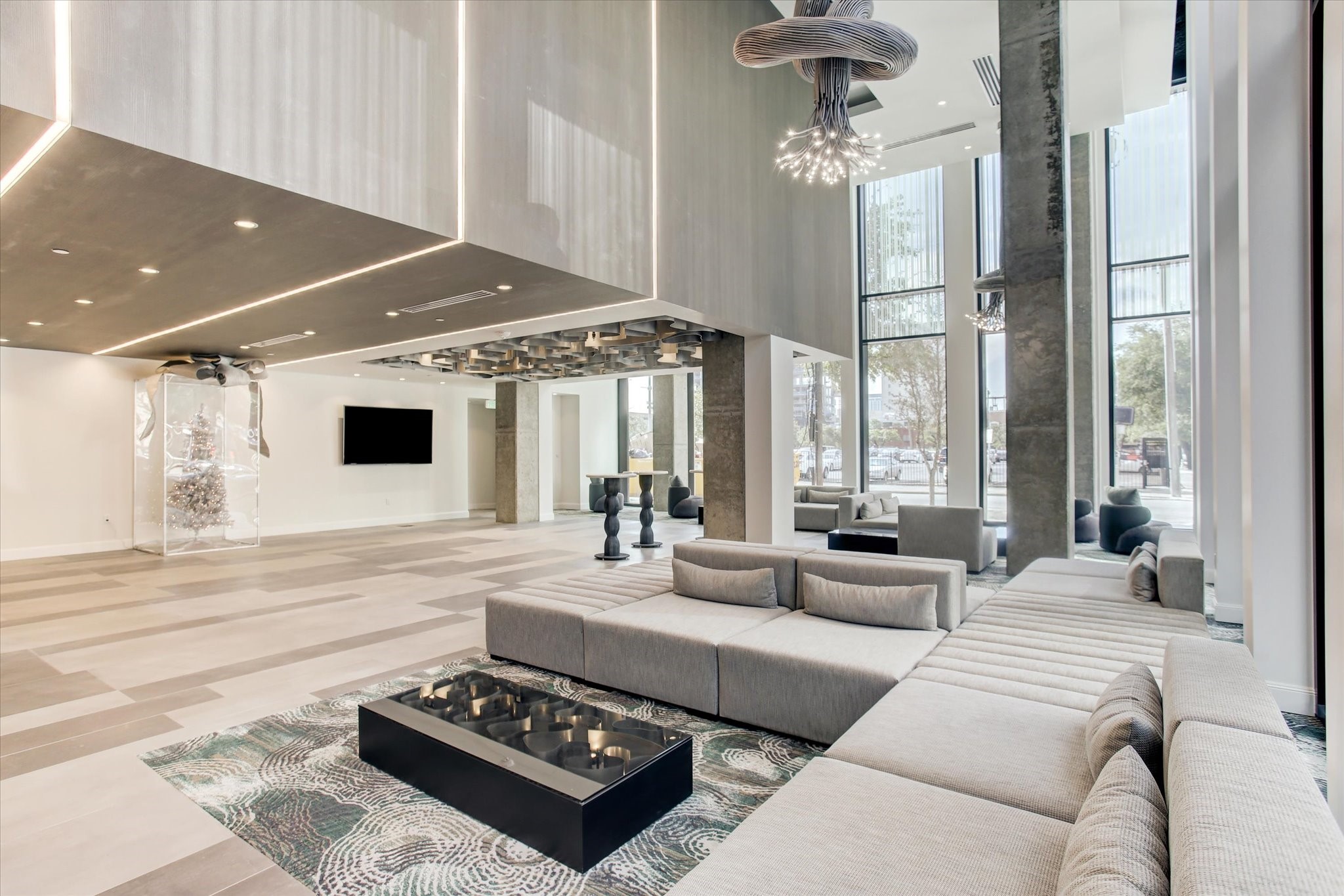 1211 Caroline Street, Unit 1007 Houston, TX 77002 - Photo 46 of 46 a living room with furniture and a large window