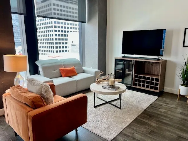 a large kitchen with cabinets and stainless steel appliances