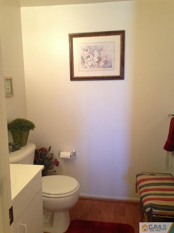 7 Spencer Street Somerset, NJ 08873 - Photo 19 of 21 a bathroom with a toilet and a sink