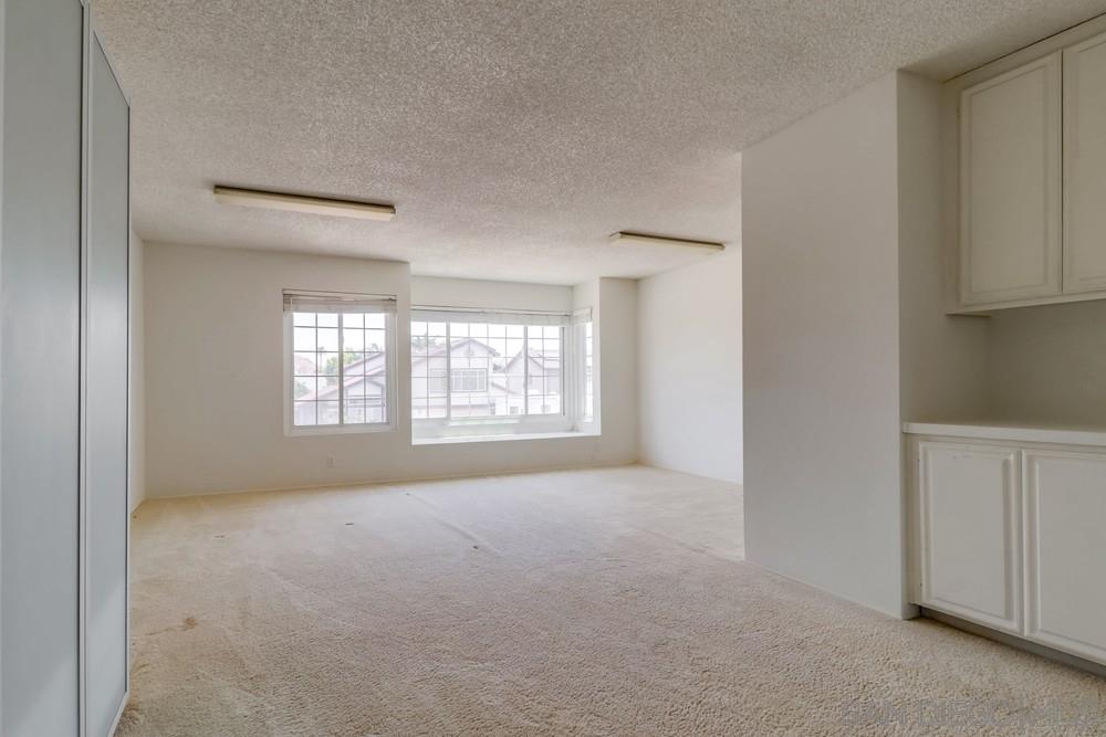 9550 Mavin Drive Santee, CA 92071 - Photo 21 of 25 Extra Large Great Room. Can be used as a 2nd master bedroom, large office space or game room.