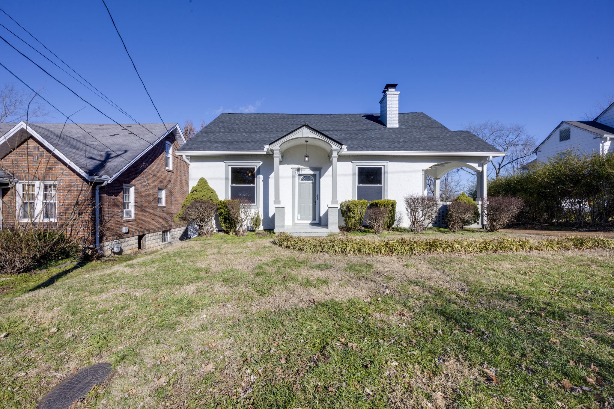 607 3rd Avenue West Springfield, TN 37172 - Photo 3 of 65 a front view of a house with a yard