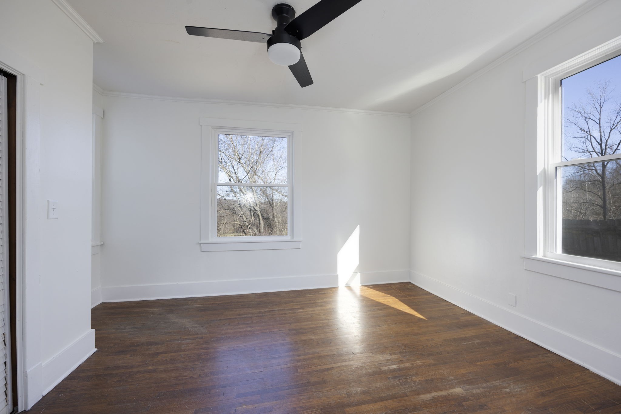 607 3rd Avenue West Springfield, TN 37172 - Photo 47 of 65 a view of empty room with wooden floor and fan