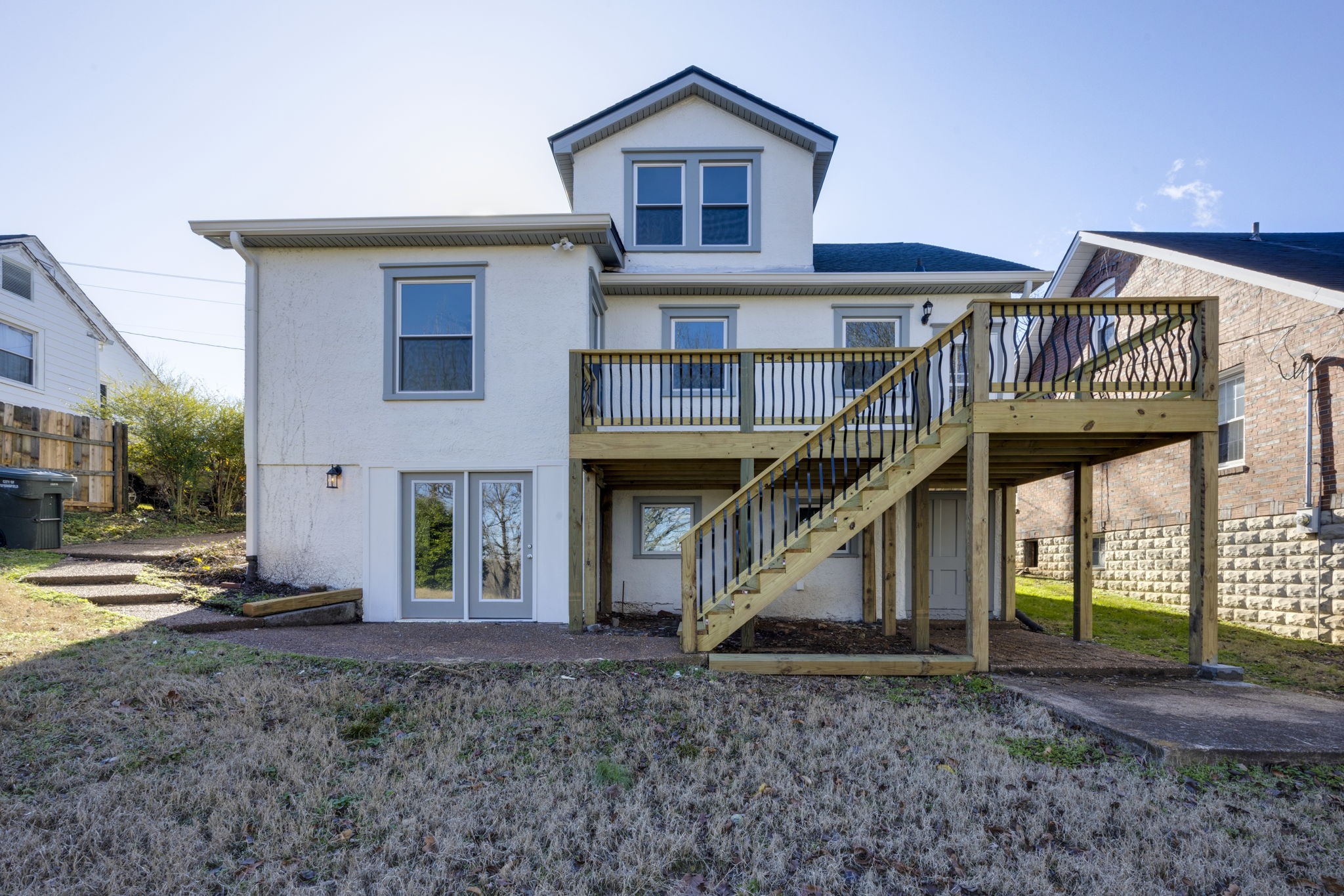 607 3rd Avenue West Springfield, TN 37172 - Photo 64 of 65 a view of a big house with a yard and plants