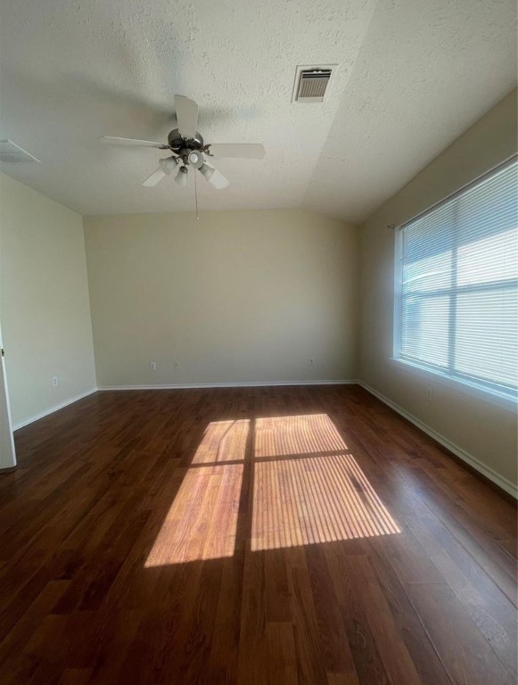 13064 Peppergate Lane Houston, TX 77044 - Photo 15 of 18 wooden floor in an empty room with a window