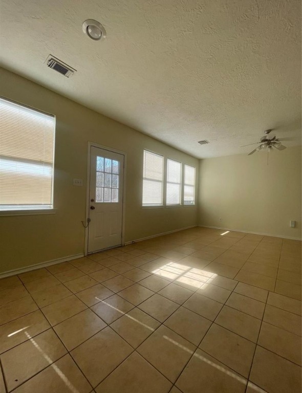 13064 Peppergate Lane Houston, TX 77044 - Photo 6 of 18 a view of an empty room with a window