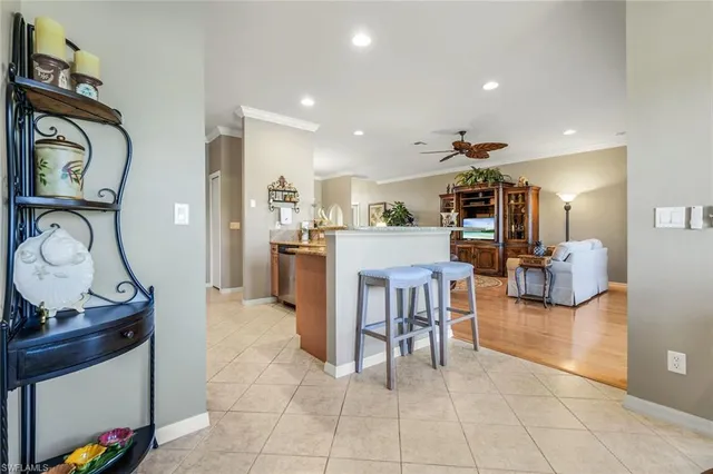 a view of kitchen with furniture and wooden floor