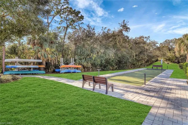 a garden view with a seating space