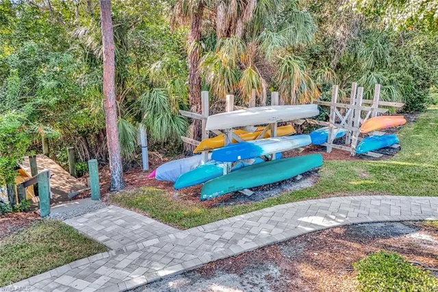 a view of a park with large trees