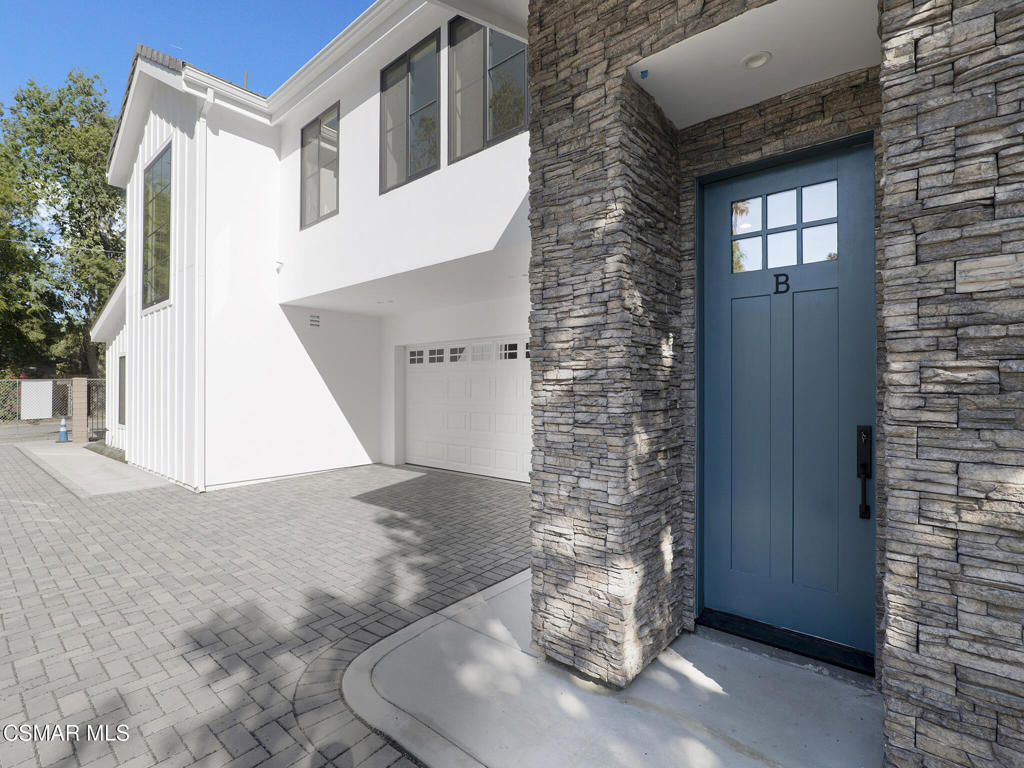 a view of entrance gate of the house