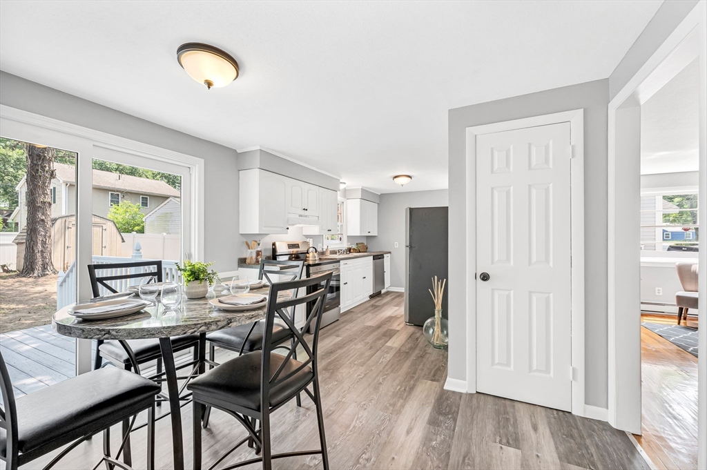 17 Delmore Street Springfield, MA 01109 - Photo 15 of 42 a view of a dining room with furniture and a window