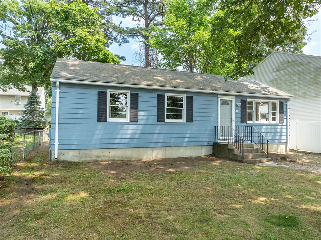 17 Delmore Street Springfield, MA 01109 - Photo 3 of 42 a backyard of a house with table and chairs