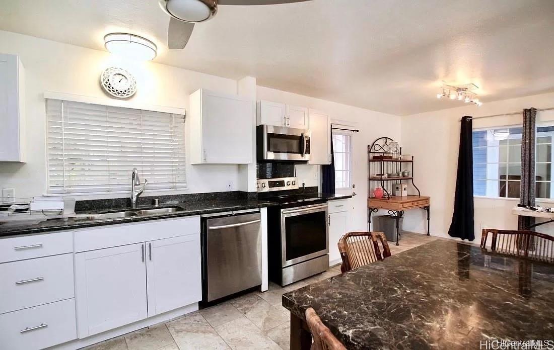 85-059 Waianae Valley Road Waianae, HI 96792 - Photo 9 of 20 a kitchen with granite countertop lots of counter top space