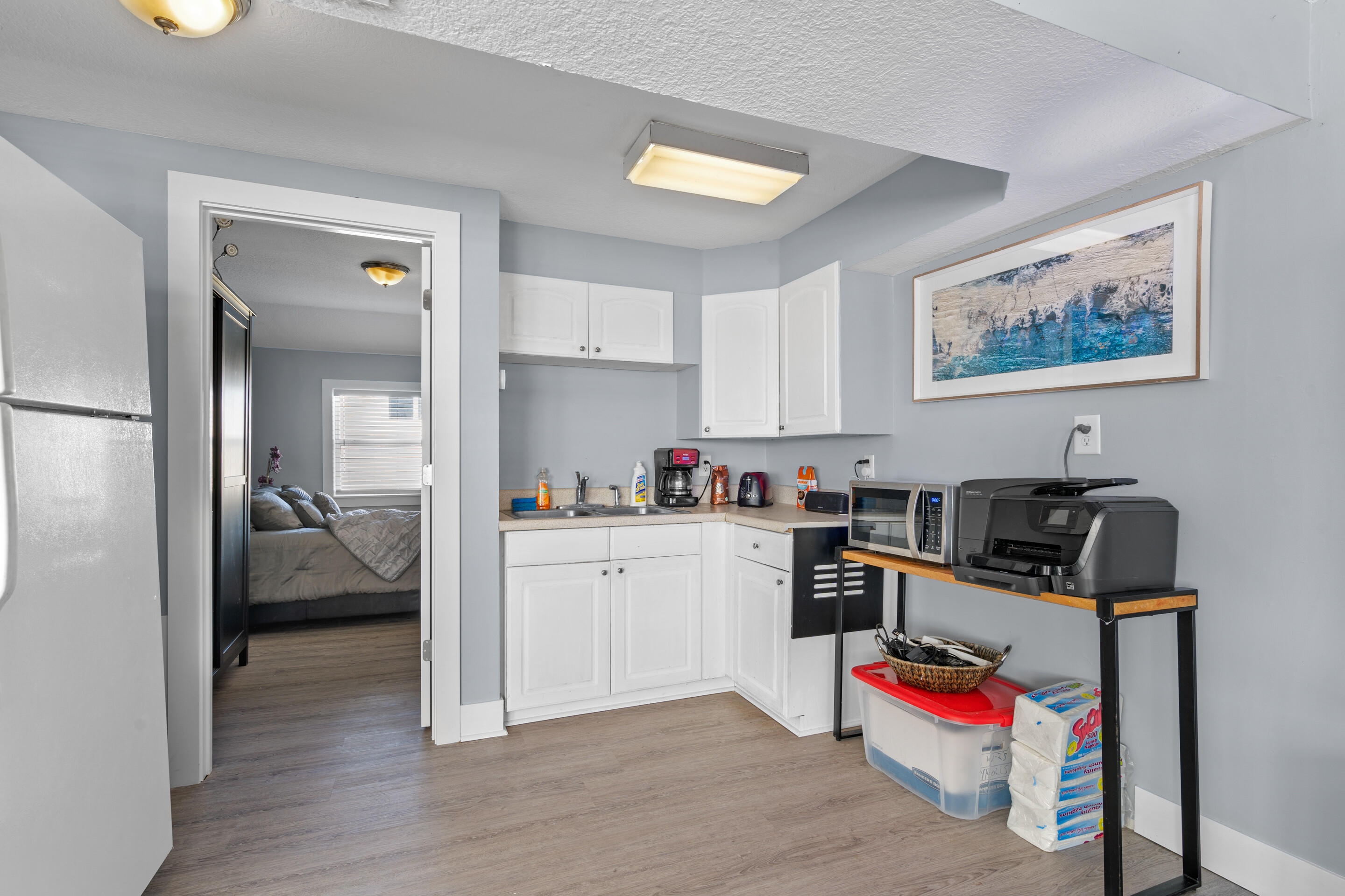 50 Cubbedge Road St. Augustine, FL 32080 - Photo 13 of 26 a kitchen with cabinets a sink and appliances