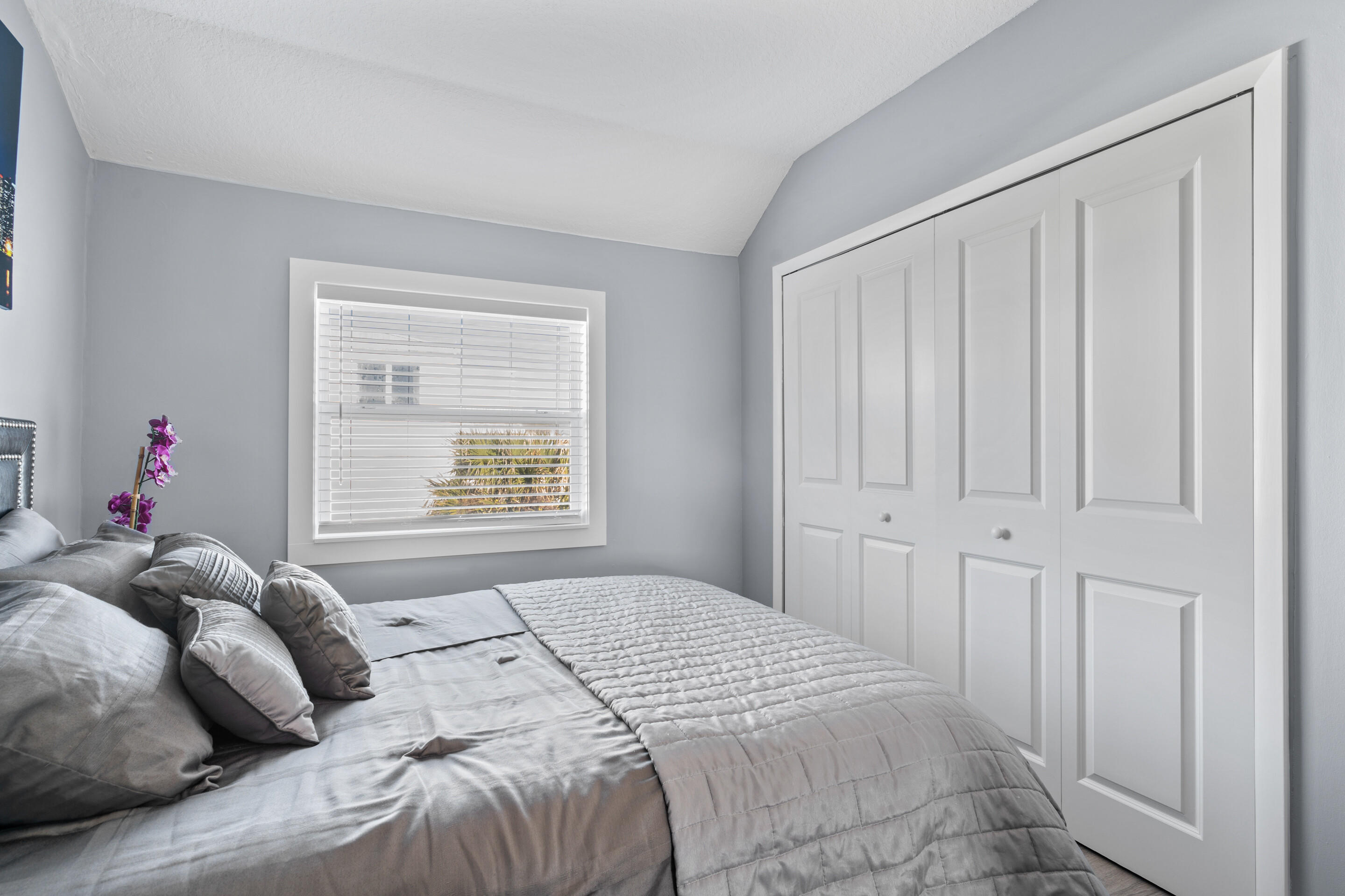 50 Cubbedge Road St. Augustine, FL 32080 - Photo 17 of 26 a bedroom with a bed and a window