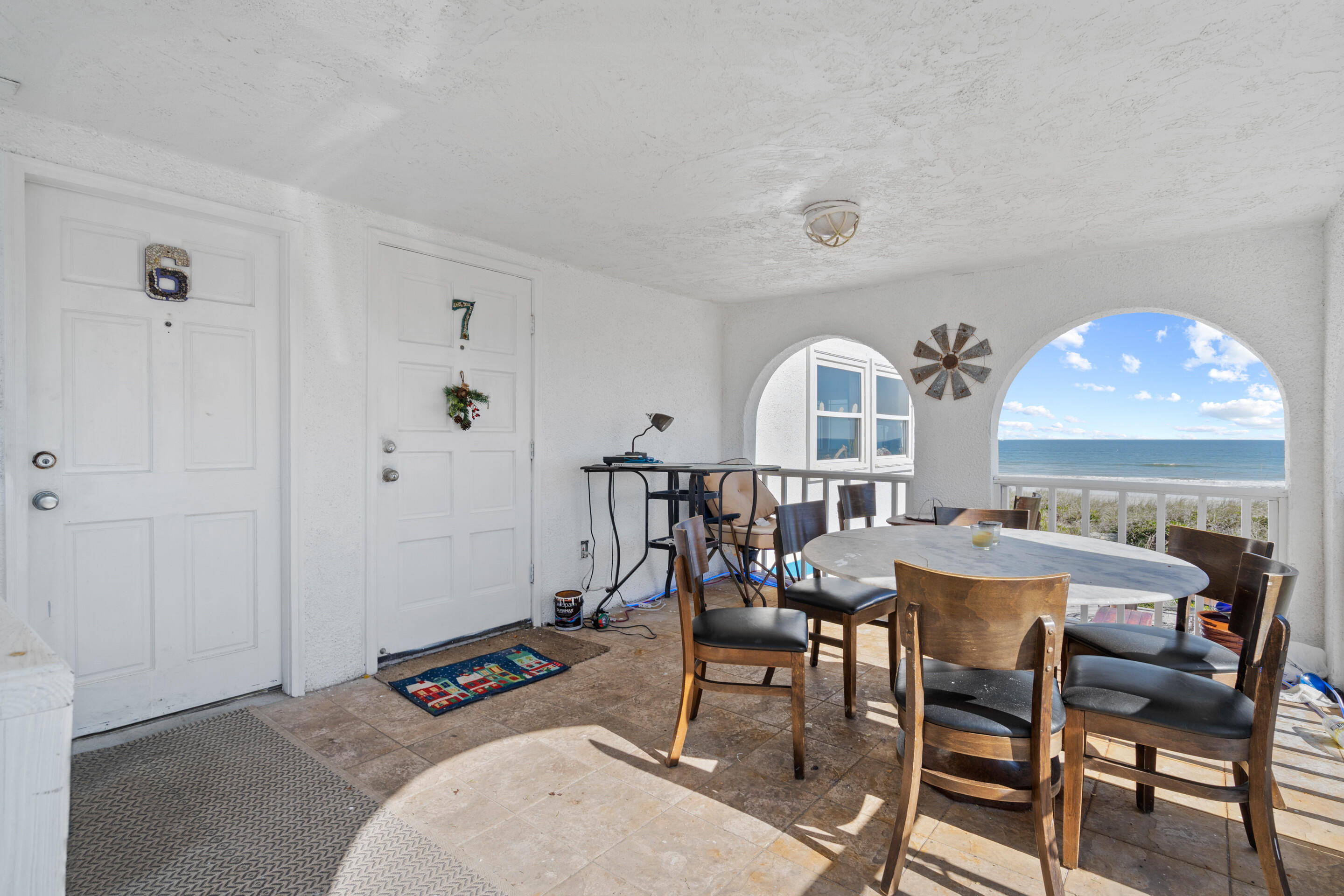 50 Cubbedge Road St. Augustine, FL 32080 - Photo 22 of 26 a view of a a dining room with furniture window and wooden floor