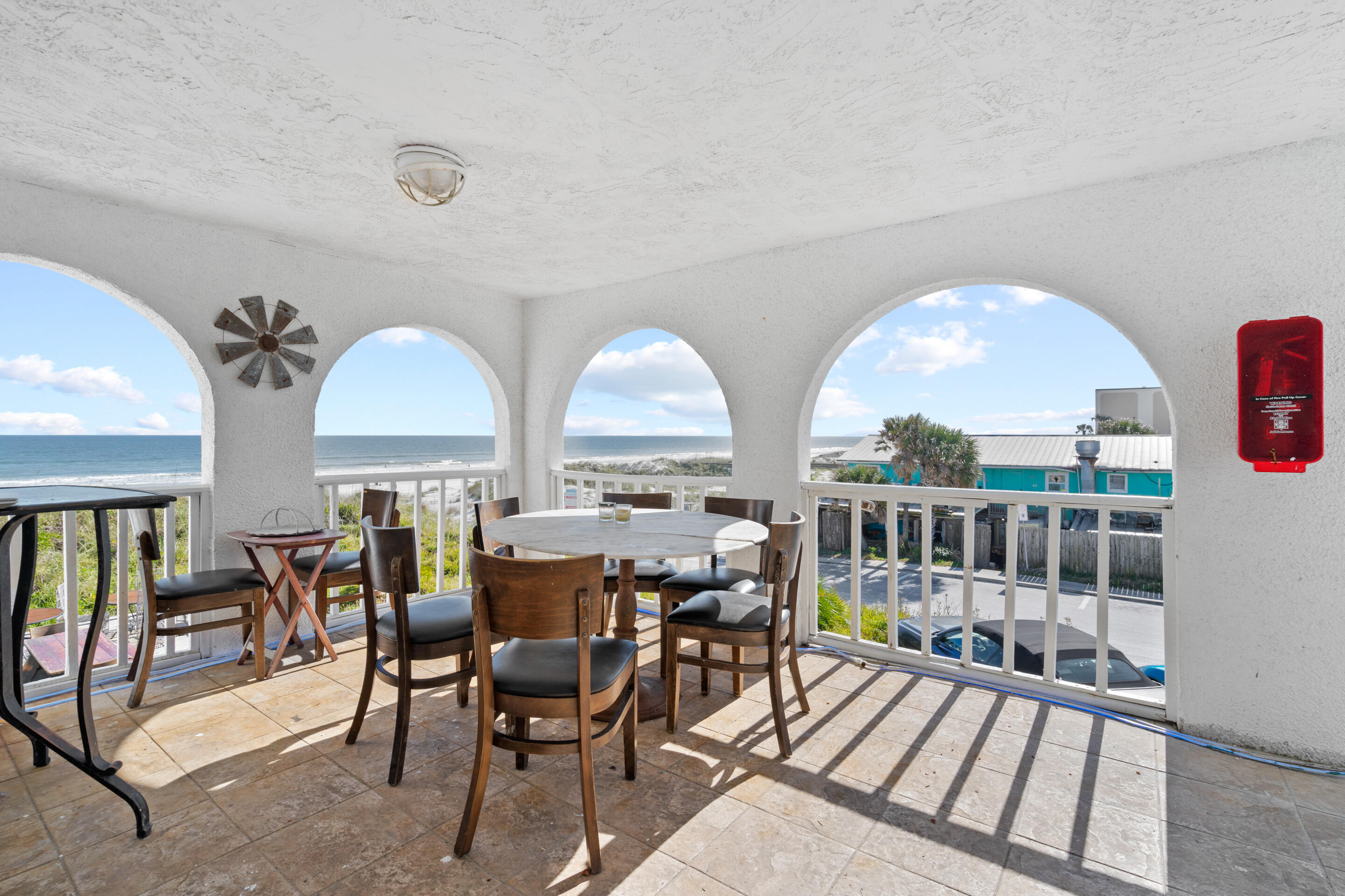 50 Cubbedge Road St. Augustine, FL 32080 - Photo 10 of 26 a view of a dining room with furniture window and wooden floor