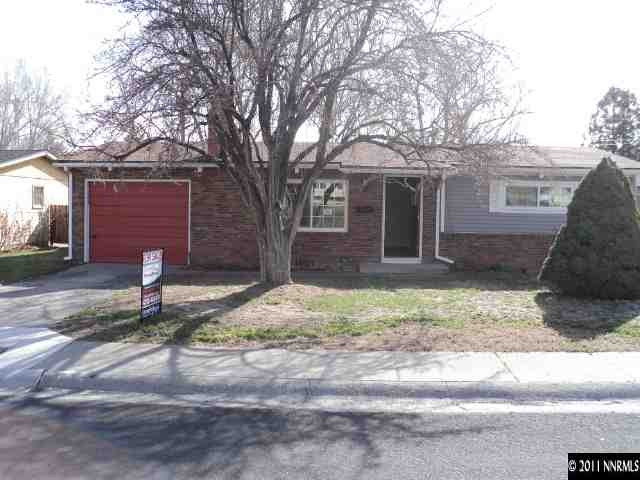 740 Reeves Avenue Reno, NV 89503 - Photo 1 of 9 a front view of a house with garden