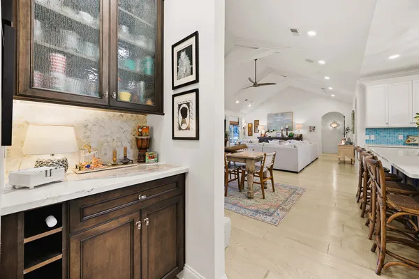 a view of cabinets and wooden floor