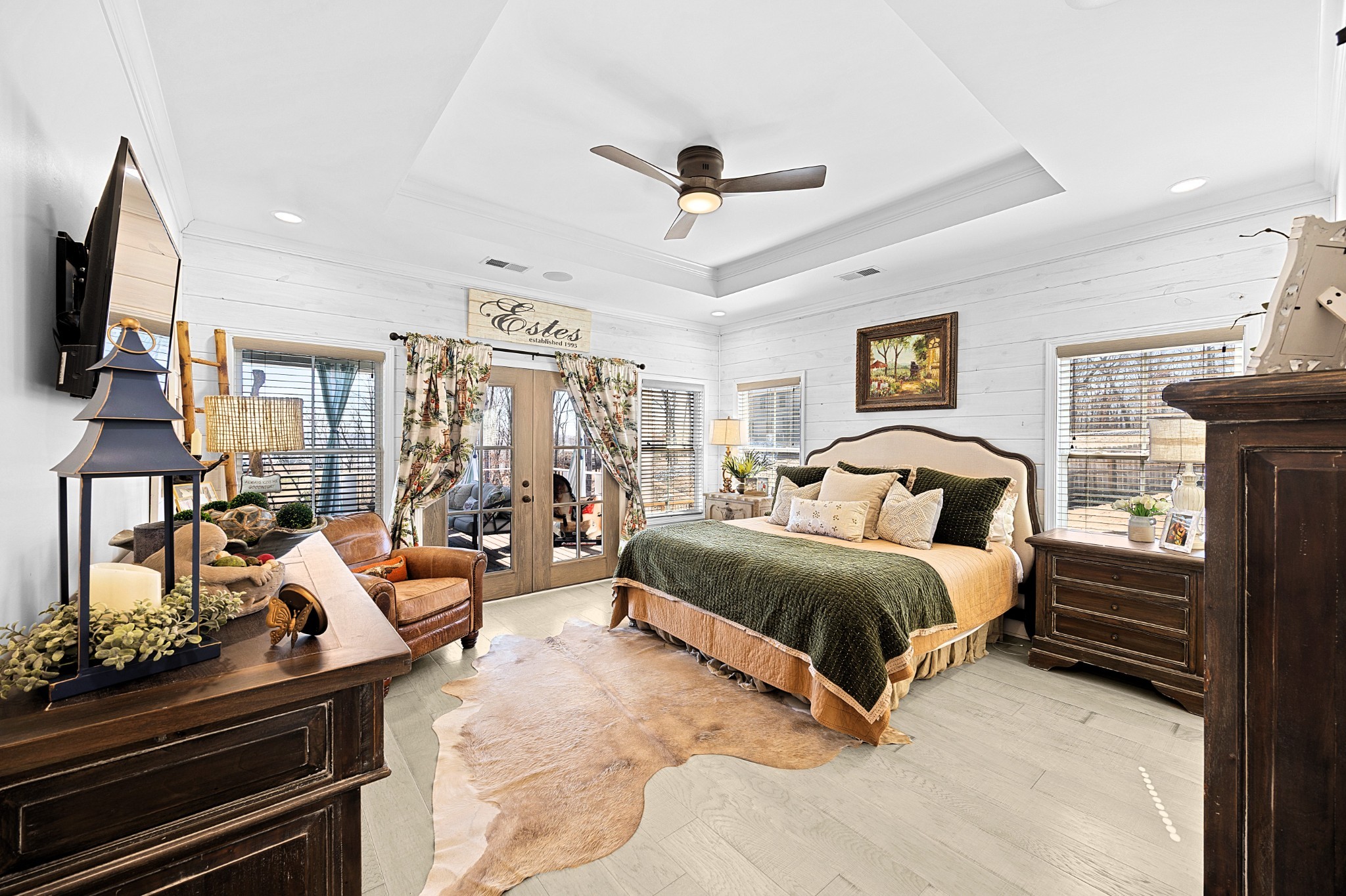 15 Barbara Road Buchanan, TN 38222 - Photo 18 of 35 a spacious bedroom with a bed a flat screen tv and windows