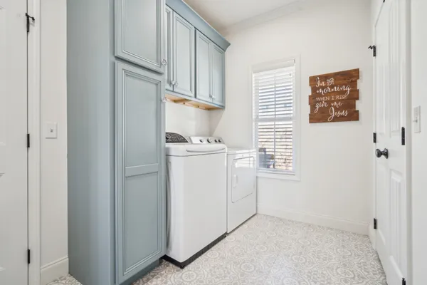 a view of a workspace with furniture and a view of bedroom