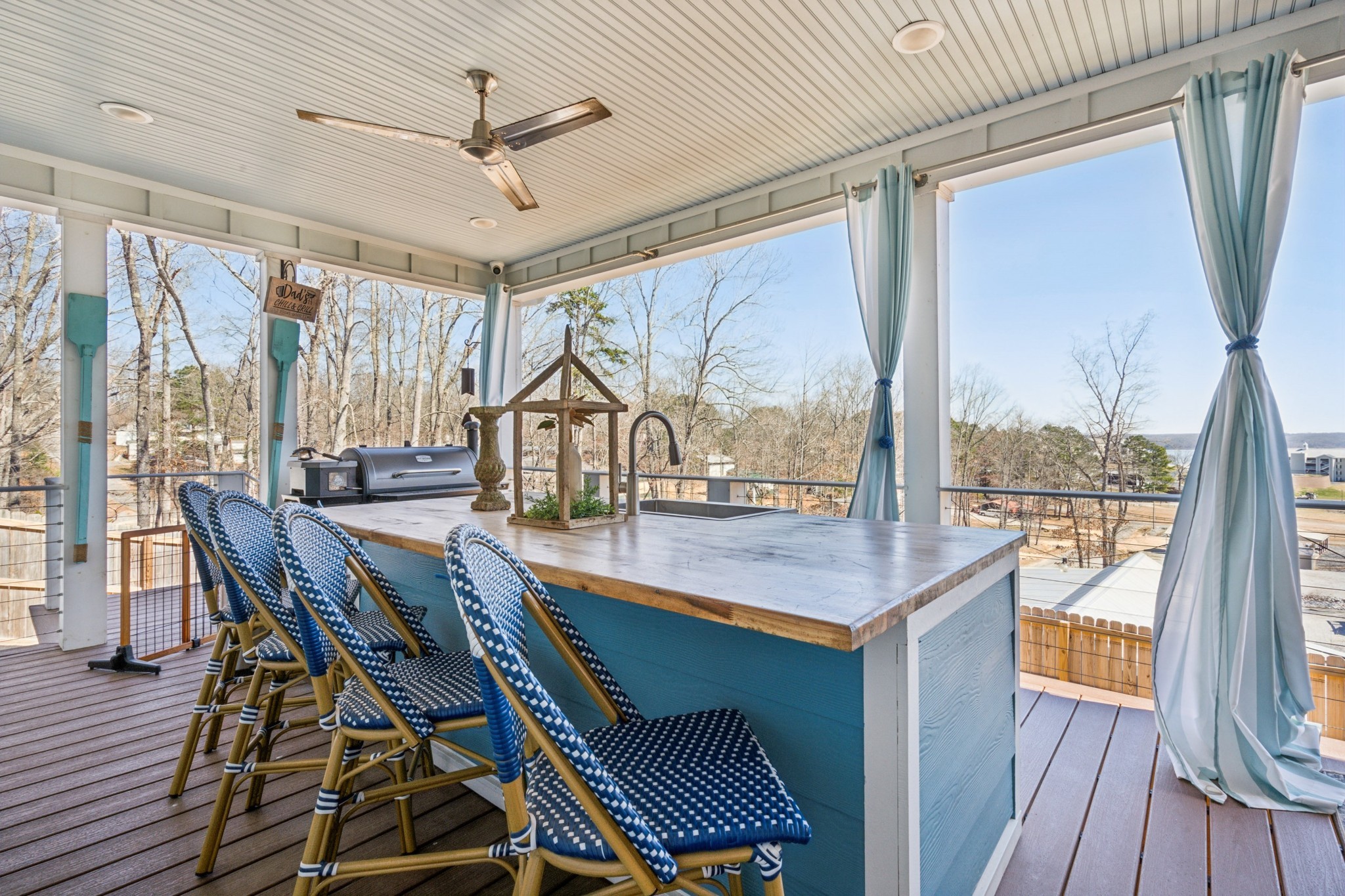15 Barbara Road Buchanan, TN 38222 - Photo 28 of 35 a dining room with wooden floor a chandelier a glass table and chairs