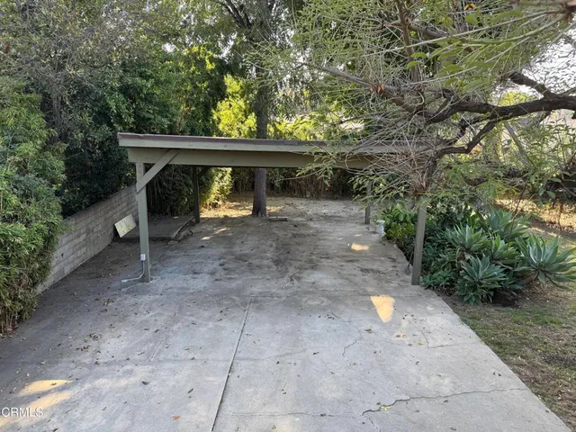 a view of a yard from a balcony
