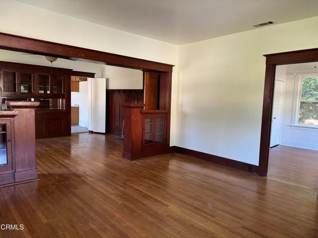 a room with closet and wooden floor