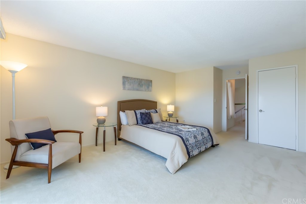 25610 Fallenleaf Drive Torrance, CA 90505 - Photo 26 of 49 a bedroom with a bed and a chair