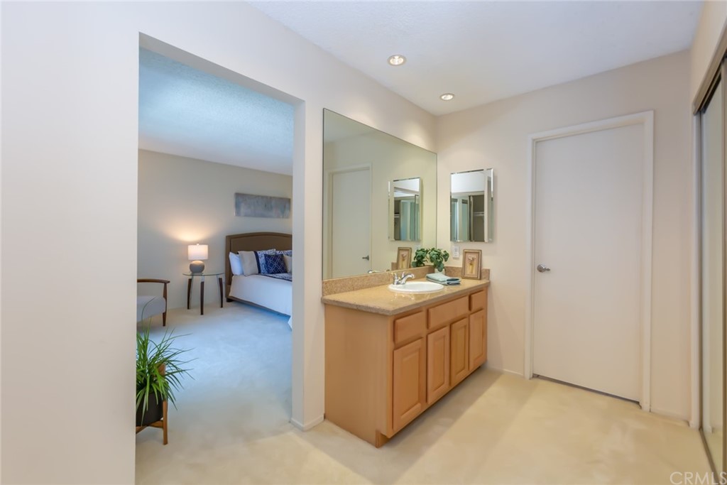 25610 Fallenleaf Drive Torrance, CA 90505 - Photo 27 of 49 a living room with a sink and a mirror