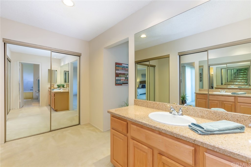 25610 Fallenleaf Drive Torrance, CA 90505 - Photo 29 of 49 a bathroom with a granite countertop sink and mirror